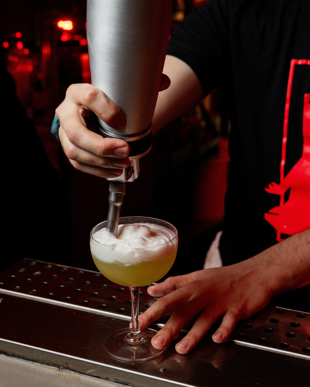 Bar Kaiju bartender crafting a cocktail
