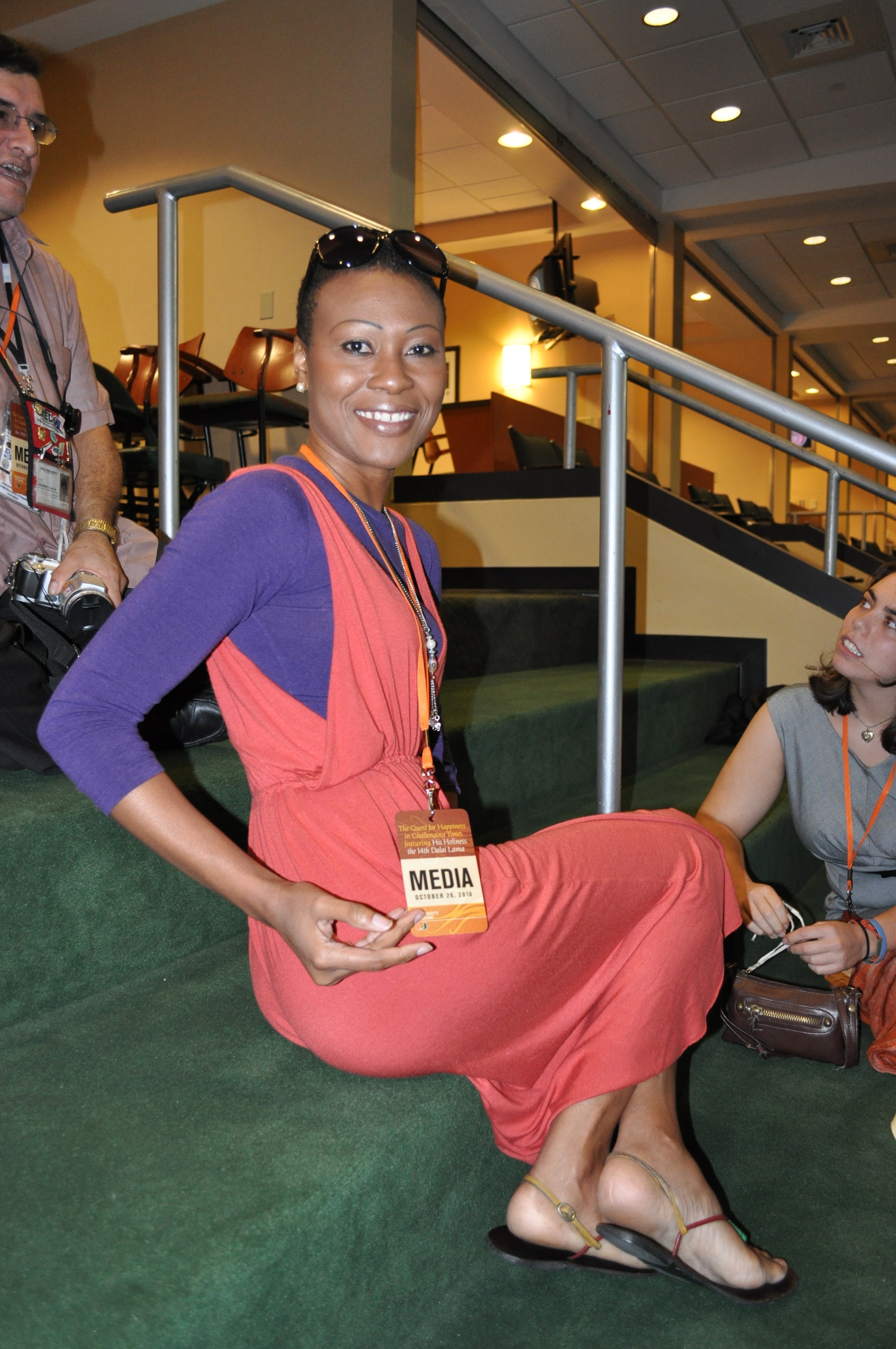 Daedrian McNaughton with media badge at the Dalai Lama event, University of Miami, 2010