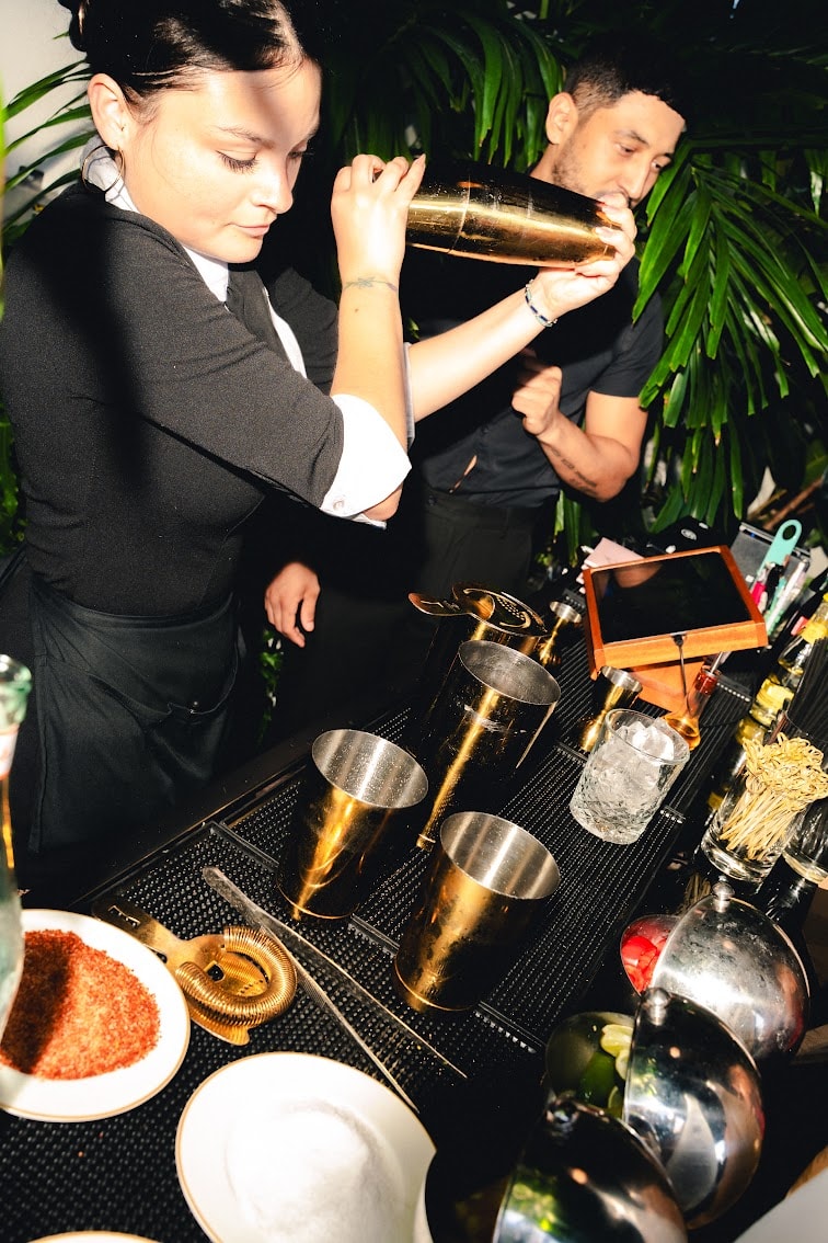 The bar team at work during Sundays on the Water. Photo courtesy of Delilah Miami.
