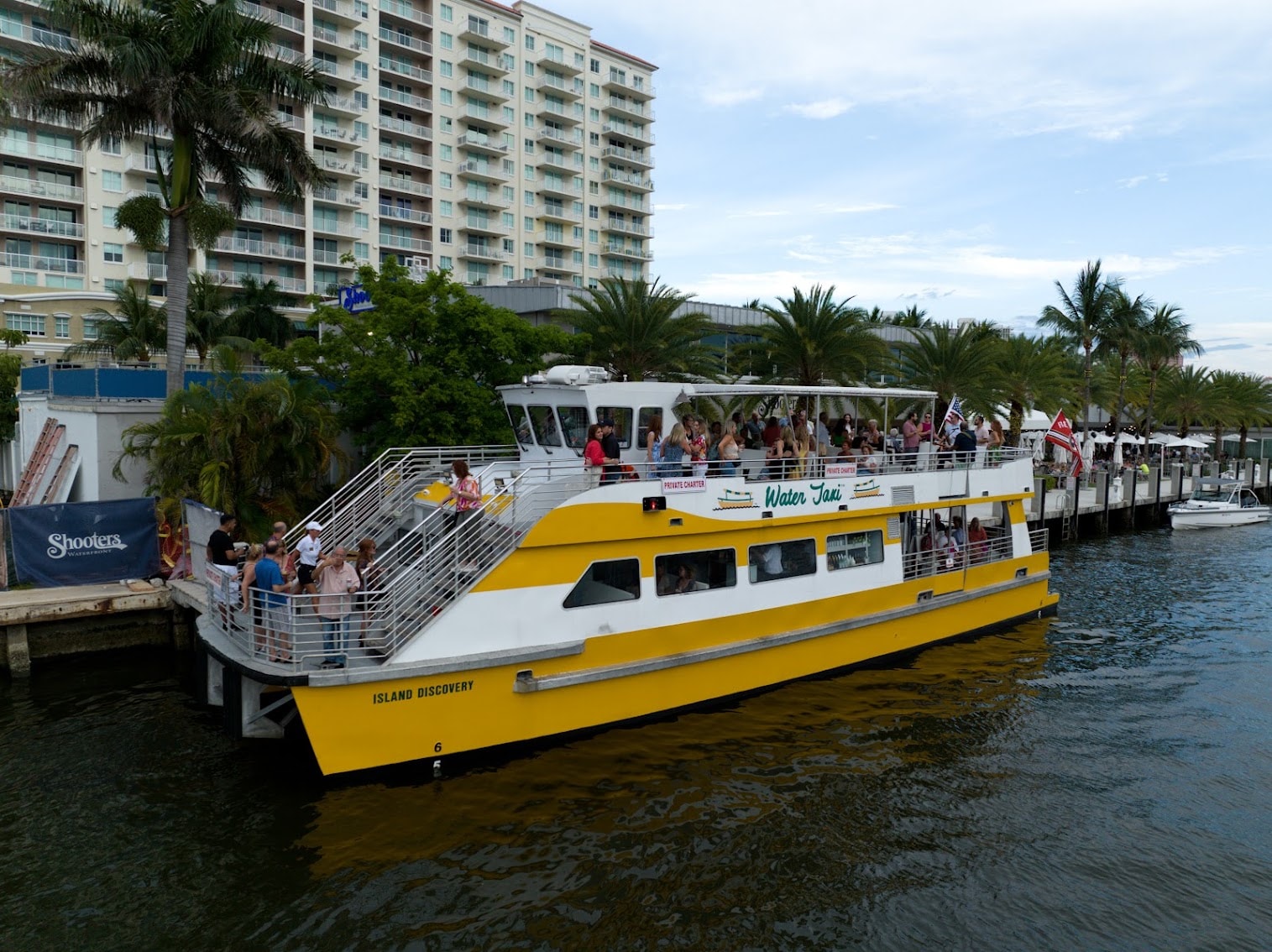 The Water Taxi docked at Shooters Waterfront — the northernmost pickup and drop-off point for FLIBS.