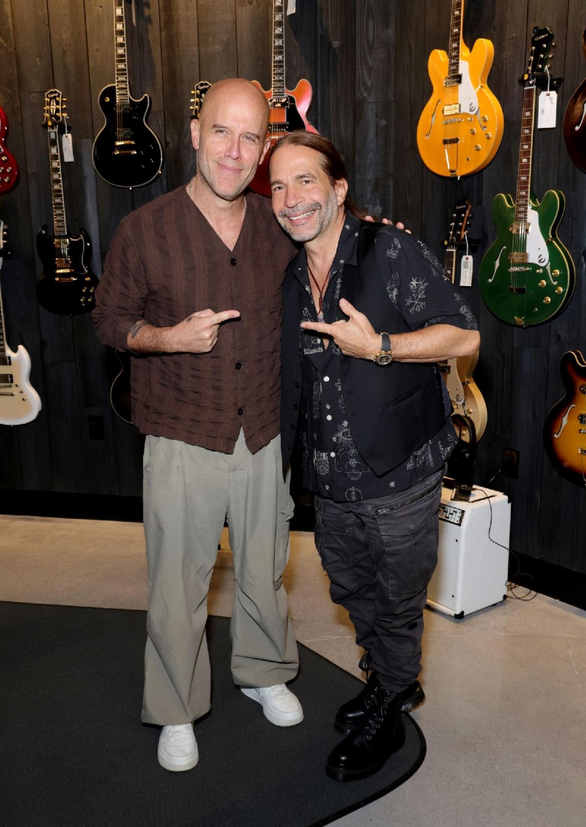 Gian Marco and Sergio Vallín of Maná at the grand opening of Gibson Garage Miami.