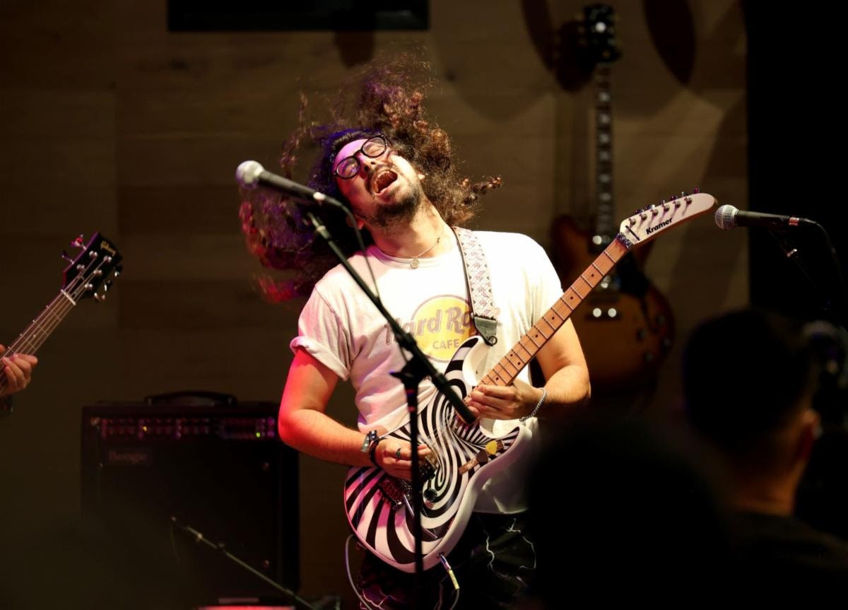 Zak Krys of the Gibson Generation Group (Gibson G3) performs at Gibson Garage Miami.