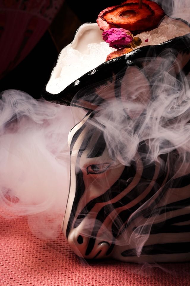 Zebra head cocktail vessel with dry ice smoke at Habibi Miami