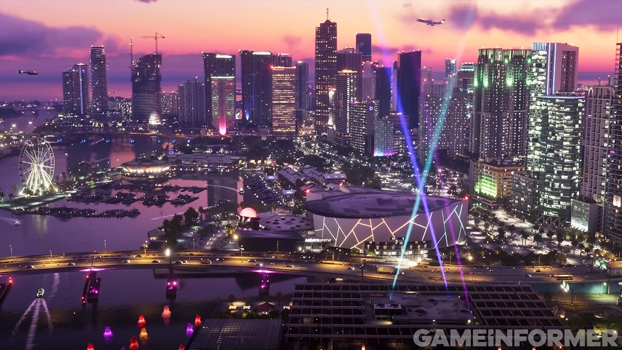 Vice City skyline from GTA 6 — Game Informer screenshot showing Miami-inspired waterfront with arena and Ferris wheel