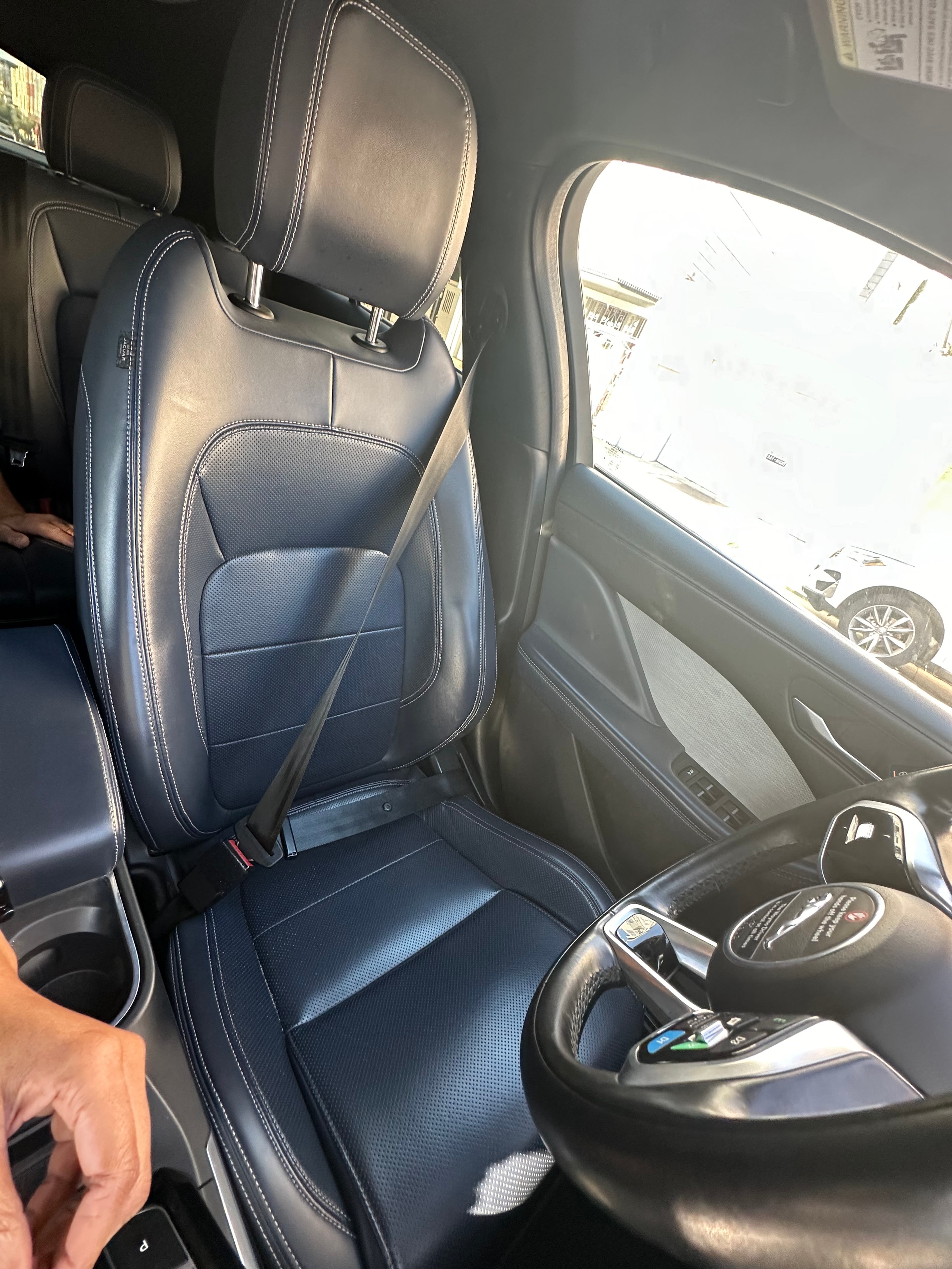 Empty front seat of a Waymo autonomous vehicle — no driver