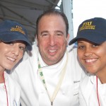 Chef Michael Schlow of Radius in Boston Mass with FIU School of Hospitality students Amy Bendik, left, and Jennifer Almonte at the Burger Bash.