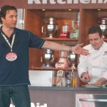 Cooking Personality Rocco DiSpirito gives a cooking demonstration assisted by FIU School of Hospitality student Kevin Purdy at the Grand Tasting Village.