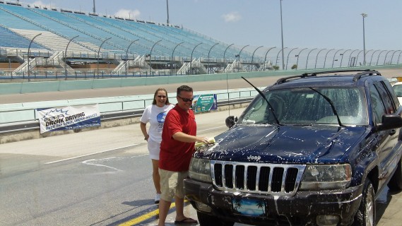 Homestead-Miami Speedway Director of Accounting Art Cordova is all smiles during NASCAR Day’s eighth anniversary.