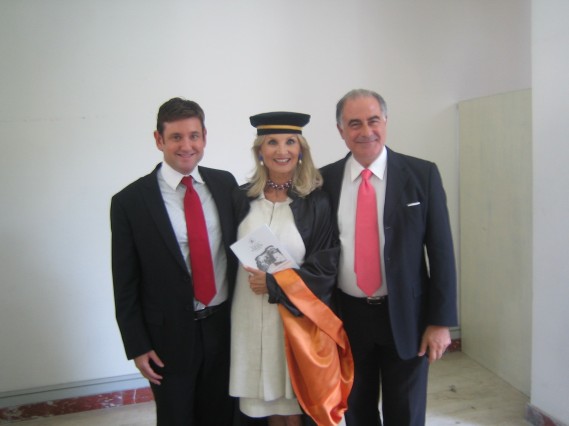 Courtesy Photo Sicilian Film Festival -  (l to r) Miami Beach Vice-Mayor, Michael Gongora and Actress, Barbara Bouchet are presented with Honorary Doctorate Degrees accompanied by Sicilian Film Festival President Emanuele Viscuso at a ceremony in Caserta, Italy.
