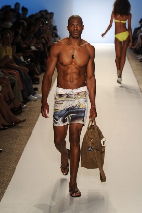 A model walks the runway at the Diesel show during Mercedes-Benz Fashion Week Swim at The Raleigh on July 14, 2011 in Miami Beach, Florida.