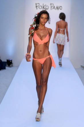 A model walks the runway at the Poko Pano show during Mercedes-Benz Fashion Week Swim at The Raleigh on July 15, 2011 in Miami Beach, Florida.