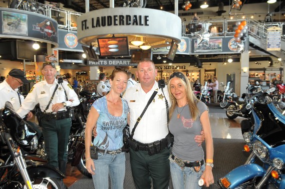 Sgt. Ian Dariot, from Broward County Sherriff’s Office, with Bruce Rossmeyer friends Wendy Miller and France Bakalich
