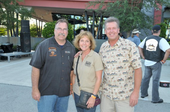 Scott Wagner, General Manager of Bruce Rossmeyer Harley-Davidson of Sunrise, Hillary Gurman, YATC Community Relations Manager, and Terry Routley, YATC Executive Director