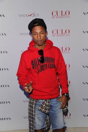 Pharrell Williams attends Andy Valmorbida, Jimmy Iovine, And Sean "Diddy" Combs, Celebrate Culo By Mazzucco, Presented By VistaJet at Mr. Chow's on December 2, 2011 in Miami, Florida.  (Photo by Andrew H. Walker/Getty Images for Andy Valmorbida)