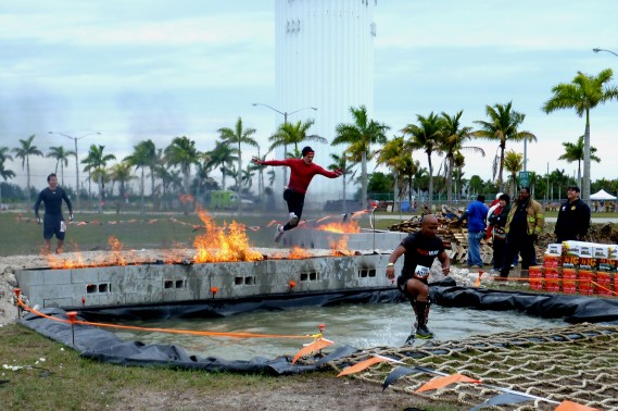 “Fire Walkers” navigate one of the hottest obstacles Sunday (March 3, 2013) during Tough Mudder at Homestead-Miami Speedway