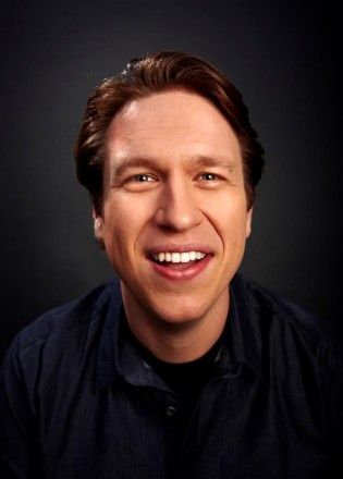 Pete Holmes performs