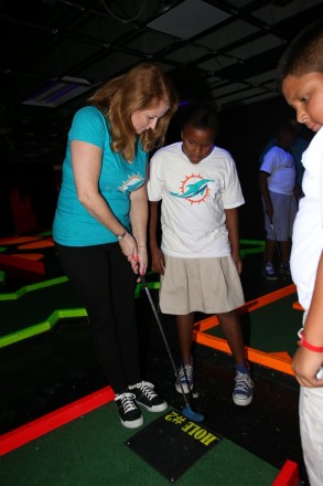 Diane Philbin with students from Benjamin Franklin K-8 Center at Action Town in Hialeah