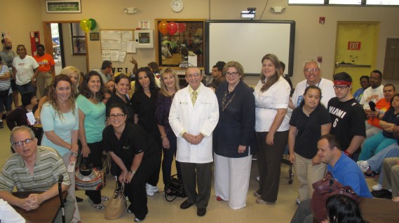 Dr. Pacin with FCAAC Staff
