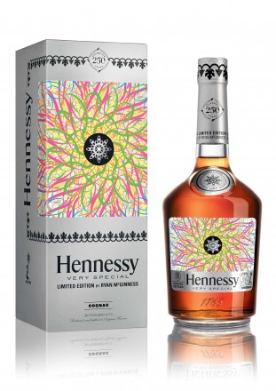 Ryan McGinness holds the Hennessy V.S Limited Edition bottle in his Chinatown Studio