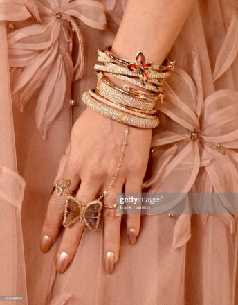 Vanessa Hudgens wore a Le Vian diamond bracelet, a Pasquale Bruni rose gold flower cuff and a Casa Reale rose gold diamond bracelet on the red carpet of the 2015 MTV Video Music Awards held at the Microsoft Theatre in Los Angeles on August 30.