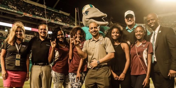 (from L-R) AutoNation Manager of Corporate Affairs & Communications Paula Levenson, AutoNation Miami Market President Benny Dominguez, students Toni-Ann, Selena Gayle, Norland High School Vice Principal Jorge Bulnes, student Tanisha, WFOR’s Kim Bokamper, student Tykerria, Miami Dolphins Senior Vice President of Communications & Community Affairs Jason Jenkins.