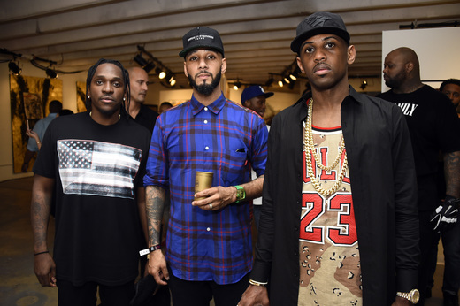 (L-R) Hip-hop artists Pusha T, Swizz Beatz and Fabolous backstage at The Dean Collection X BACARDI Untameable House Party on December 4, 2015 in Miami, Florida. 
