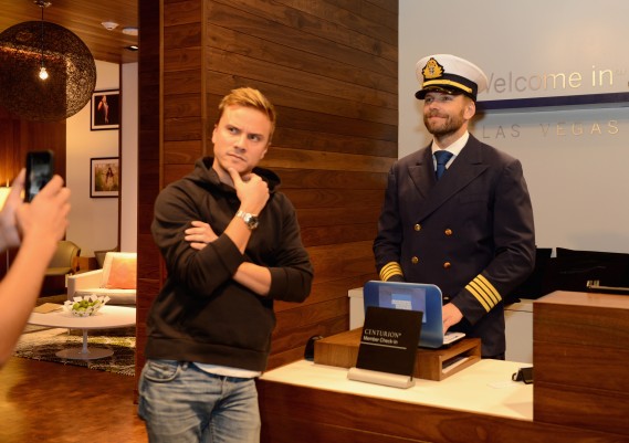 Joel McHale surprised American Express Card Members in The Centurion Lounge at Las Vegas to kick-off seven days of "Amex Cheer" within the lounge network on December 14, 2015 in Las Vegas, Nevada. 