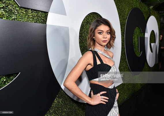 Sarah Hyland wore rings by Bavna, Maxior and Marli to the GQ 20th Anniversary Men Of The Year Party at Chateau Marmont on December 3, 2015 in Los Angeles, California. 