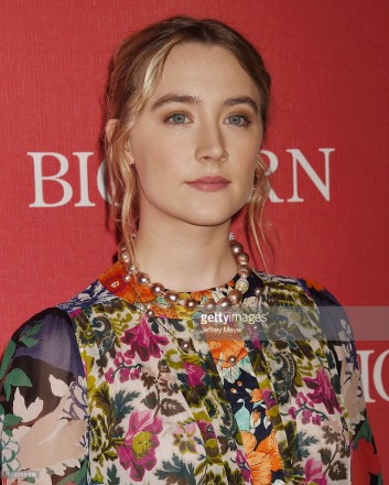 Saoirse Ronan wore two Yoko London Pearl and Diamond Necklaces to the 27th Annual Palm Springs International Film Festival Awards Gala at the Palm Springs Convention Center on January 2, 2016 in Palm Springs, California.