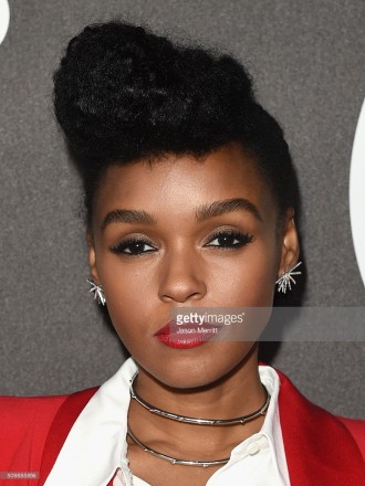 Janelle Monae wore a Cristiano Burani pant suit, Jack Vartanian diamond earrings, Casa Reale diamond rings and a Harry Kotlar diamond and ruby ring to the 2016 Billboard Power 100 Celebration at Bouchon Beverly Hills on February 12, 2016 in Beverly Hills, California.