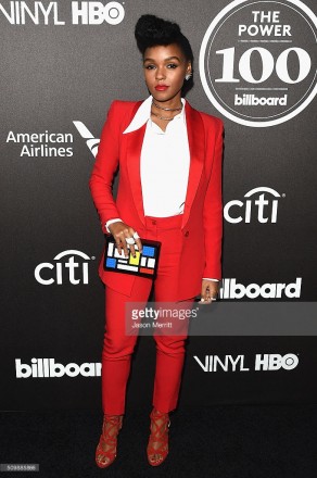 Janelle Monae wore a Cristiano Burani pant suit, Jack Vartanian diamond earrings, Casa Reale diamond rings and a Harry Kotlar diamond and ruby ring to the 2016 Billboard Power 100 Celebration at Bouchon Beverly Hills on February 12, 2016 in Beverly Hills, California.