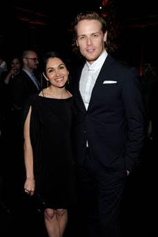 From L-R:  Actress Lela Loren (“Power”) poses with “Outlander” star Sam Heughan at the book two premiere after party at the American Museum of Natural History. 
