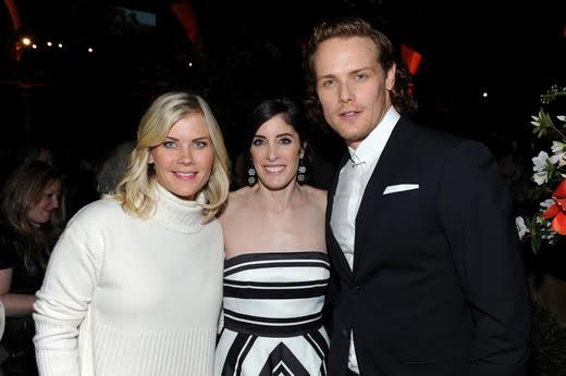 From L-R:  Actress and “Outlander” fan Alison Sweeney poses with executive producer Maril Davis and series star Sam Heughan at the book two premiere after party at the American Museum of Natural History. 