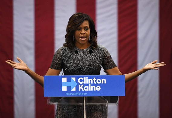 First Lady Michelle Obama speaks to a crowd of supporters as she campaigns for the Democratic Party presidential nominee Hillary Clinton at the Convention Center, in Phoenix, Arizona on October 20, 2016. / AFP / Mark RALSTON        (Photo credit should read MARK RALSTON/AFP/Getty Images)