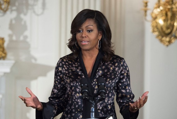US First Lady Michelle Obama delivers remarks to middle school, high school and college students from across the country as part of the ongoing series of The GRAMMY Museum musical workshops, at the White House on October 21, 2016, in Washington, DC.   / AFP / MOLLY RILEY        (Photo credit should read MOLLY RILEY/AFP/Getty Images)