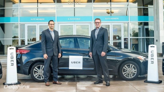 Uber South Florida General Manager Kasra Moshkani and Miami Dolphins President & CEO Tom Garfinkel