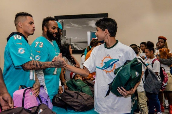 Miami Dolphins Host Back to School Backpack Event