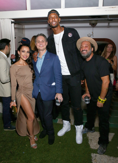 (L-R) Adrienne Bosh, Jason Binn, NBA player Chris Bosh, and artist Mr. Brainwash attend the DuJour Media, Gilt & JetSmarter party to kick off Art Basel at The Confidante on November 30, 2016 in Miami Beach, Florida. (Photo by Astrid Stawiarz/Getty Images for DuJour)