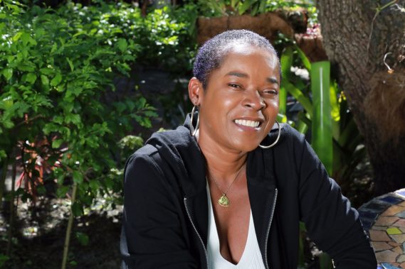 Sharon Marley wears the PIC LOVE Small Necklace.