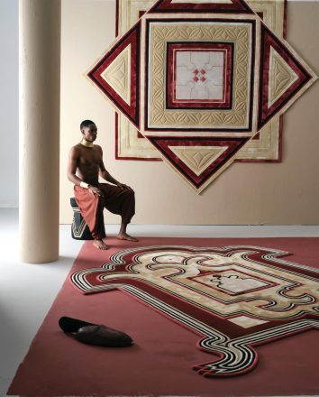 A wall embroidery and carpet, part of the Kinooni Dialogue series  by Fuli Carpets and Marcel Van Doorn