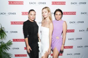 "MIAMI BEACH, FLORIDA - NOVEMBER 30: (L-R) Kimberly Taylor Gindi, Elizabeth Sulcer, and Paula Sanders attend Clarins & Each X Other Miami Art Basel celebration at Gitano on November 30, 2022 in Miami Beach, Florida. (Photo by Mark Sagliocco/Getty Images for Each x Other )"