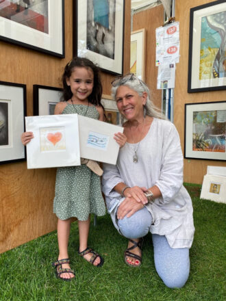 Ronna Katz with young patron