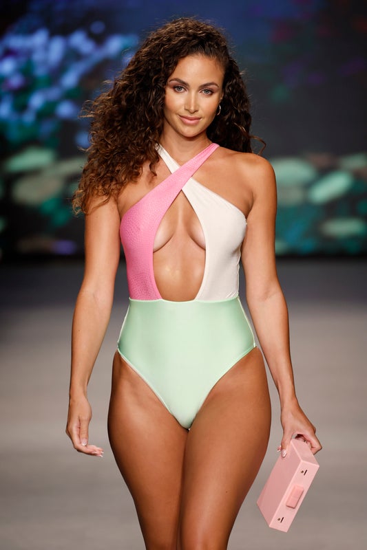 MIAMI BEACH, FLORIDA - JUNE 09: A model walks the runway for the Sinesia Karol Fashion Show during Paraiso Miami Swim Week at The Paraiso Tent on June 09, 2023 in Miami Beach, Florida. (Photo by Frazer Harrison/Getty Images for Sinesia Karol)