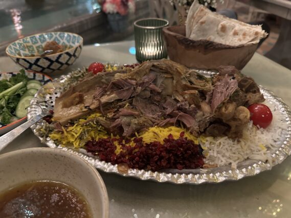 Parisa's signature dish, the Sini Ghajari. A whole piece of succulent lamb shank served with a choice of rice