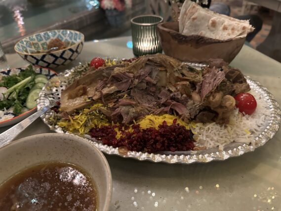 Parisa's signature dish, the Sini Ghajari. A whole piece of succulent lamb shank served with a choice of rice