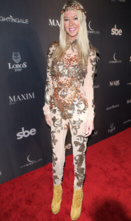 Tara Reid looked glamorous in a shimmery ensemble as she attended the official MAXIM 2023 Halloween Party presented by MADE Special and VIP Nightlife, at Nightingale Plaza on Saturday, October 28th in Los Angeles, CA. The event was also sponsored by Lobos 1707 Tequila.