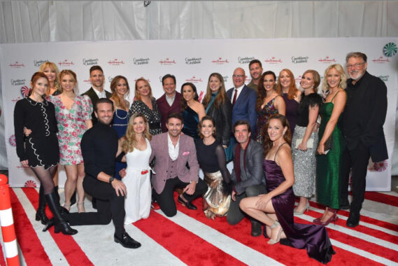 (Back Row - L:R Sarah Ramos, Melissa Peterman, Ali Liebert, Andrew Walker, Nikki DeLoach, Lisa Hamilton Daly, Scott Wolf, Lacey Chabert, Samantha DiPippo, Mike Perry, Luke Macfarlane, Erin Cahill, Annie Howell, Cindy Busby, Jessy Schram, and Jonathan Frakes) (Front Row - L:R John Brotherton, Brooke D’Orsay, Jonathan Bennett, Ashley Williams, Lucas Bryant, and Crystal Lowe)