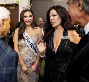 FGO Interim General Director Maria Todaro and Juliette Valle, Miss Florida 2023, meet patrons at intermission on opening night of La traviata. Photo by Eduardo Schneider.