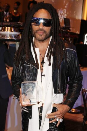 LOS ANGELES, CALIFORNIA - FEBRUARY 01: Lenny Kravitz poses with the Recording Academy Global Impact Award during the Recording Academy Honors presented by The Black Music Collective during the 66th GRAMMY Awards on February 01, 2024 in Los Angeles, California. (Photo by Johnny Nunez/Getty Images for The Recording Academy)