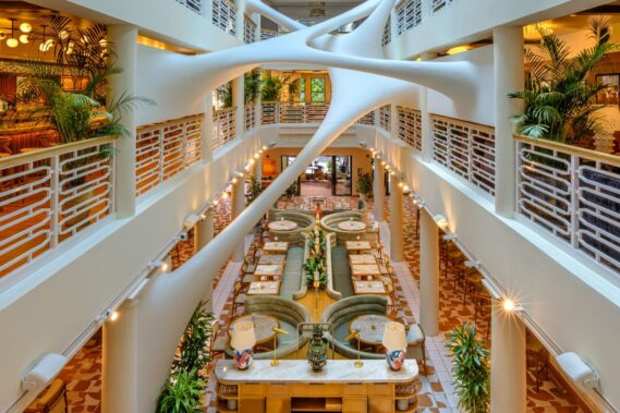 The restaurant Elastika, located below its namesake, the installation by Zaha Hadid. Photo by Todd Coleman. Courtesy of WoodHouse